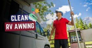 Man cleaning RV awning outdoors with easy maintenance tips for fresh, durable, and long-lasting camper use